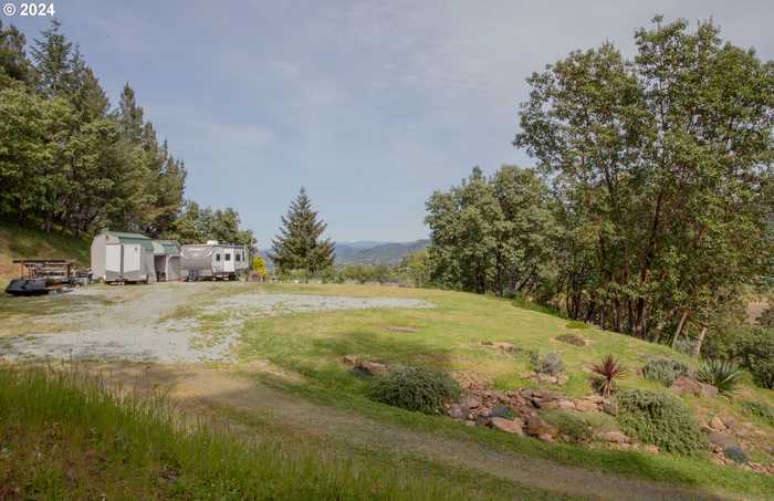 photo 1: 3177 WEAVER RD, Myrtle Creek OR 97457