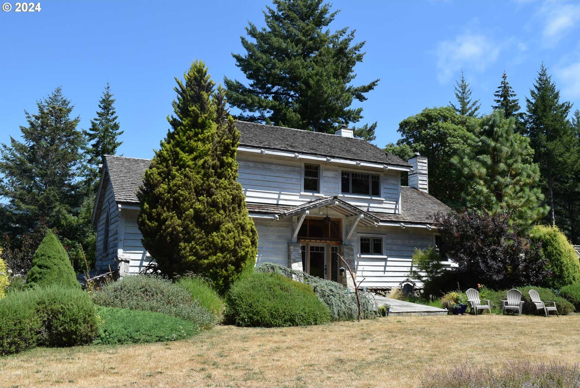 photo 1: 97137 N BANK ROGUE RIVER RD, Gold Beach OR 97444