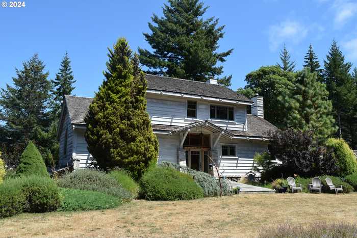 photo 1: 97137 N BANK ROGUE RIVER RD, Gold Beach OR 97444