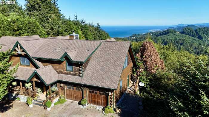 photo 1: 27217 EIGHTY ACRES RD, Gold Beach OR 97444