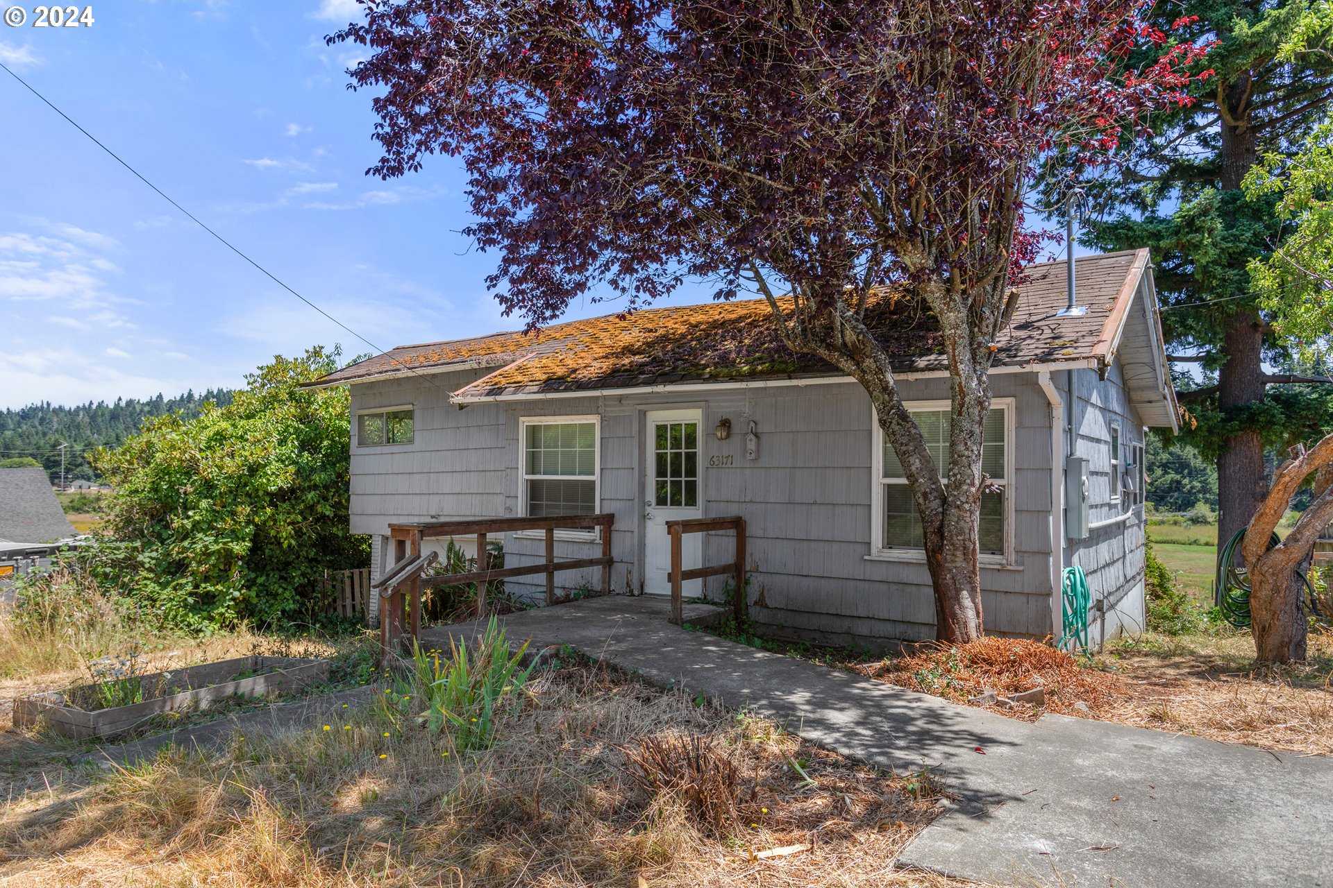 photo 1: 63171 FRUITDALE RD, Coos Bay OR 97420