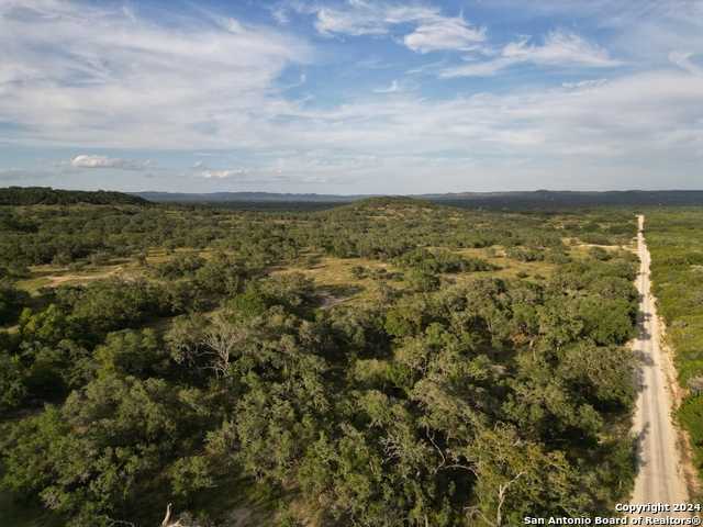 photo 1: 397 Bruin Creek Rd, Bandera TX 78003