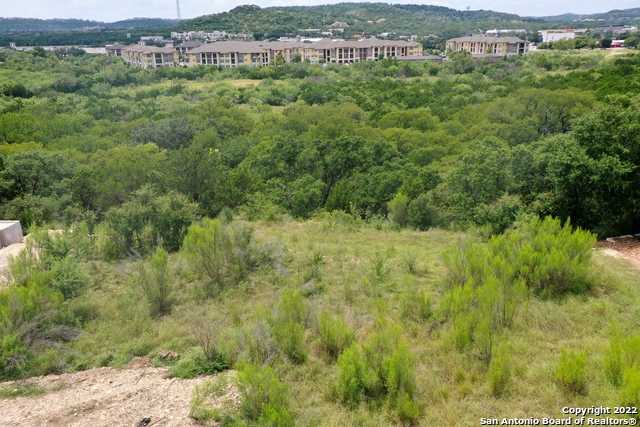 photo 1: 24419 Cliff Line, San Antonio TX 78257