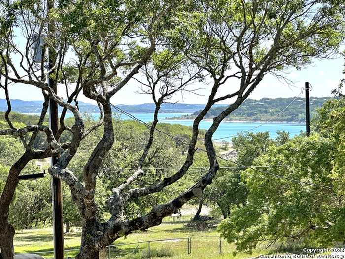 photo 1: 228 OAK HIDEAWAY DR, Canyon Lake TX 78133