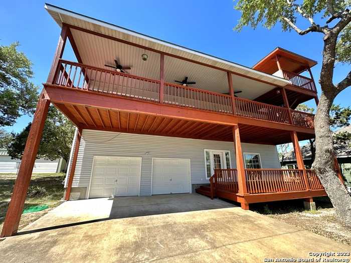 photo 2: 228 OAK HIDEAWAY DR, Canyon Lake TX 78133