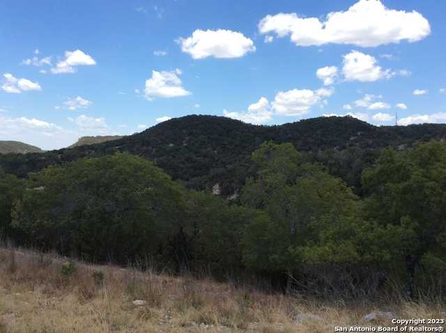 photo 1: 973 DEAD POACHER TRAIL, Bandera TX 78003