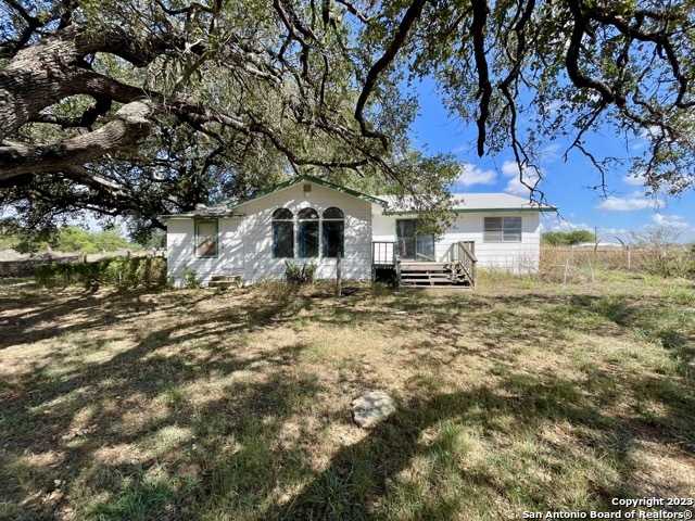 photo 1: 284 County Road 6612, Devine TX 78016