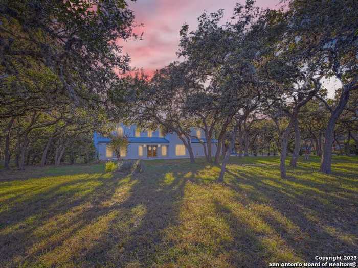 photo 1: 10624 PARRIGIN RD, Helotes TX 78023