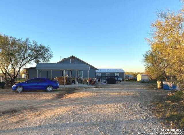 photo 1: 105 County Road 775, Devine TX 78016