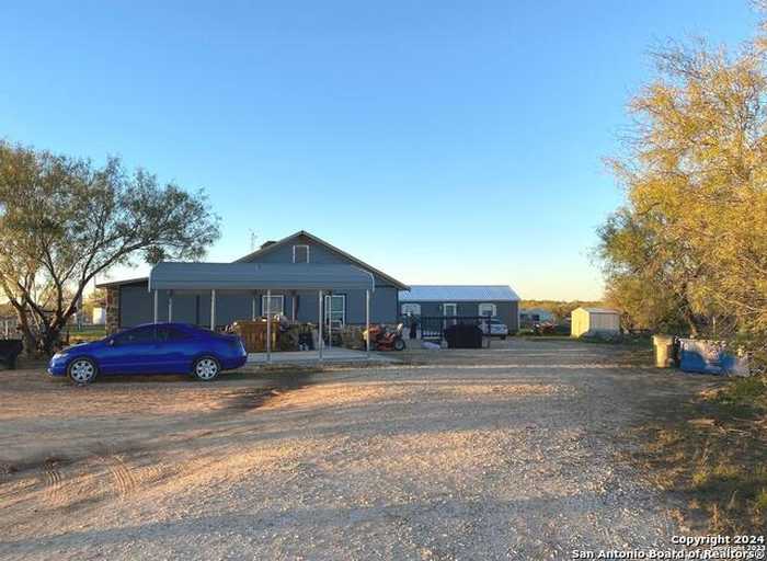 photo 1: 105 County Road 775, Devine TX 78016