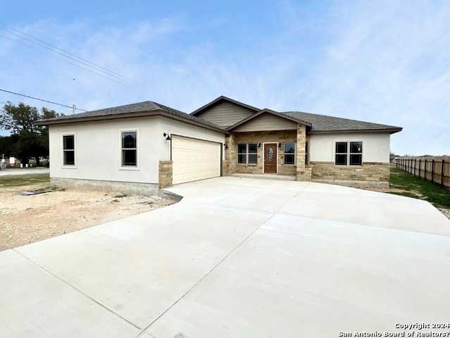 photo 1: 1220 DEVINE DR, Devine TX 78016