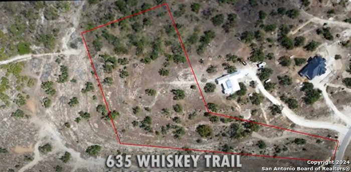 photo 1: 635 Whiskey Trail, Blanco TX 78130