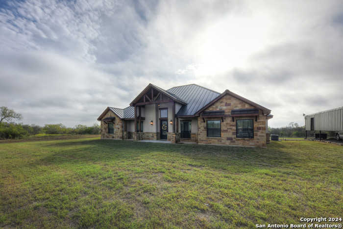 photo 1: 5436 COUNTY ROAD 4514, Devine TX 78016