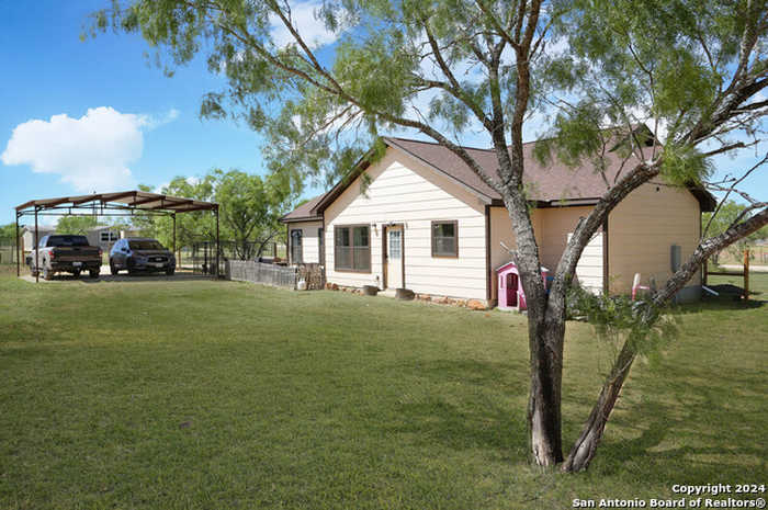 photo 1: 141 County Road 2667, Devine TX 78016