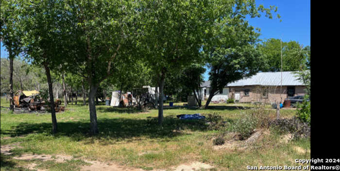 photo 1: 406 S Teel, Devine TX 78016