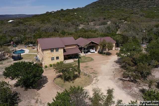 photo 1: 735 N Saddle Mountain Rd, Leakey TX 78873