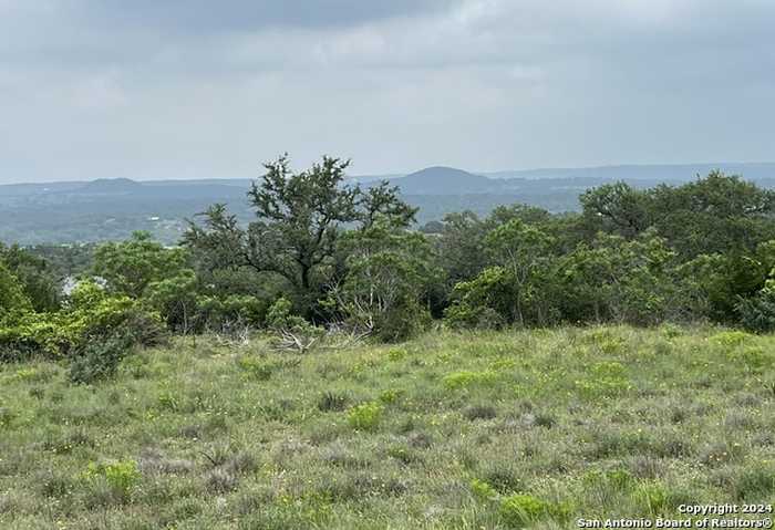 photo 1: 23 Lipan Apache Run, Blanco TX 78606