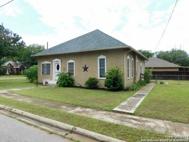 photo 1: 301 Jefferson Drive, Devine TX 78016