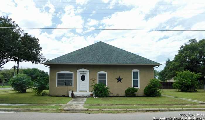 photo 1: 301 Jefferson Drive, Devine TX 78016