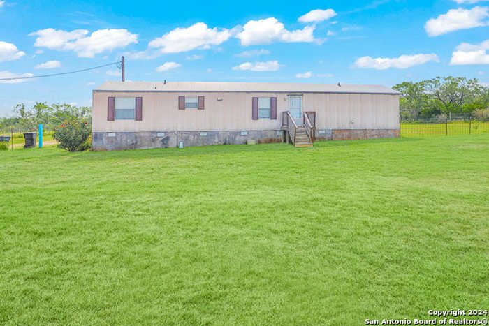 photo 1: 1325 County Road 773, Devine TX 78016