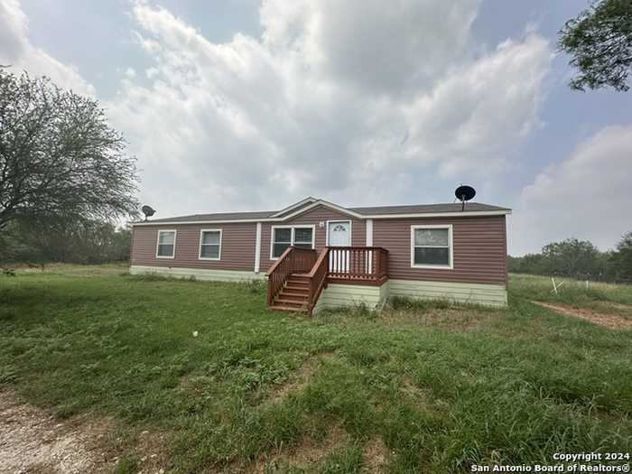 photo 1: 107 County Road 2670, Moore TX 78061