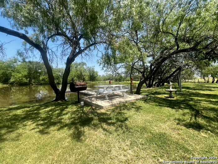 photo 1: 660 TREY'S CREEK RD, Floresville TX 78114