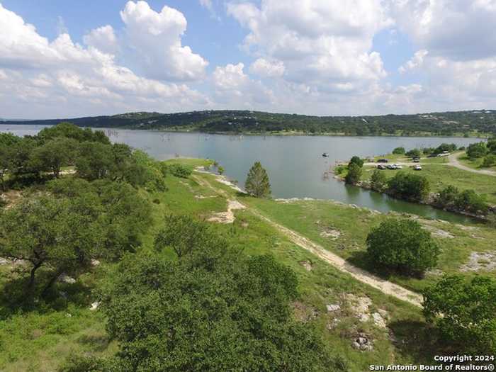 photo 1: 1516 ENSENADA DR, Canyon Lake TX 78133