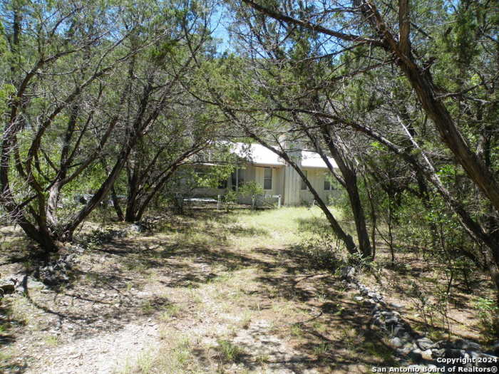 photo 1: 804 BLUFF CREEK RD, Leakey TX 78873