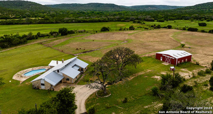 photo 1: 1407 Hay Hollar Rd, Bandera TX 78003