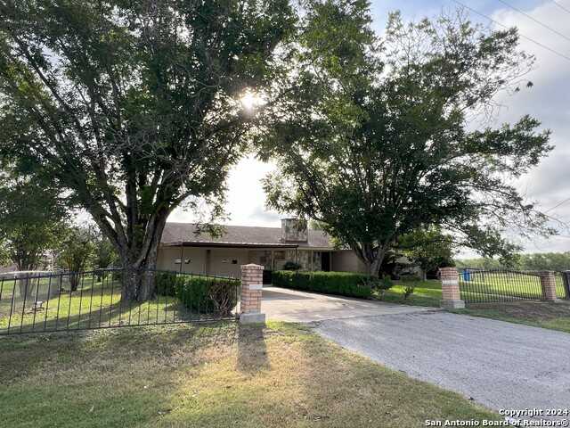 photo 1: 414 HIGHWAY 173 S, Devine TX 78016