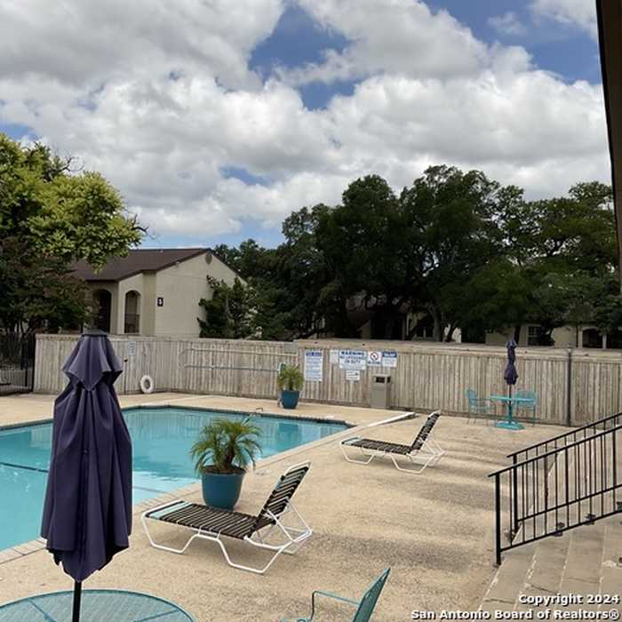 photo 1: 8702 VILLAGE DR Unit 123, San Antonio TX 78217