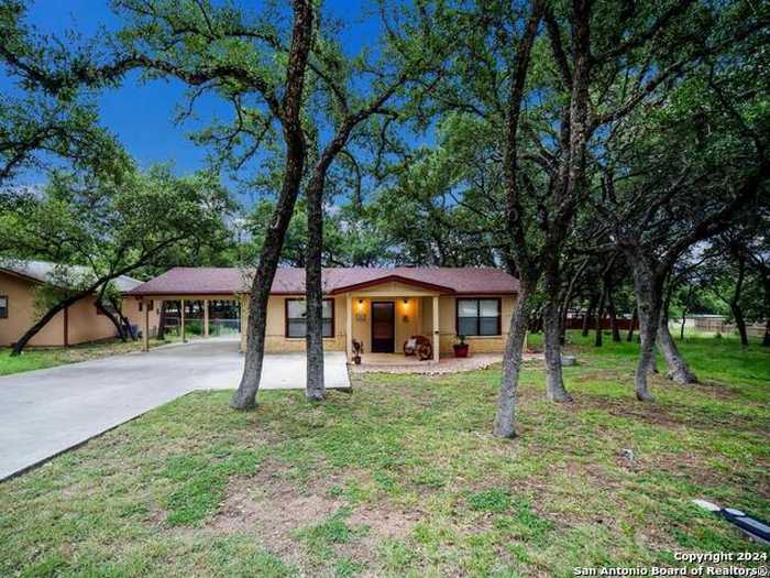 photo 1: 1525 HILLCREST FOREST, Canyon Lake TX 78133