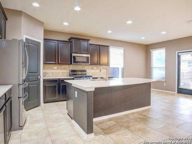 photo 1: 10608 Hibiscus Cove, Helotes TX 78023