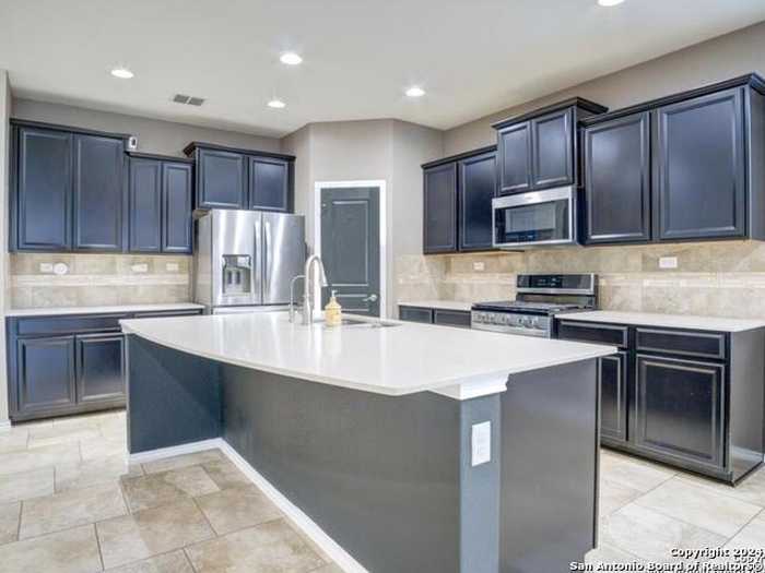 photo 1: 10608 Hibiscus Cove, Helotes TX 78023