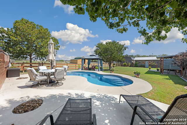 photo 1: 1501 COUNTY ROAD 320, Floresville TX 78114