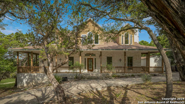 photo 1: 18705 Lookout Mountain Trl, Helotes TX 78023