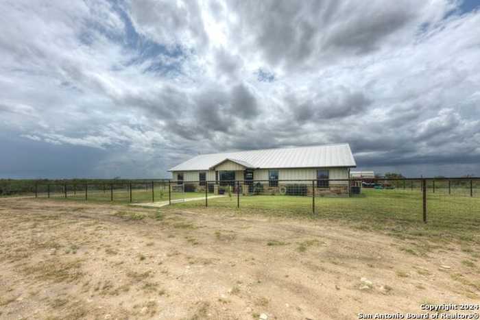 photo 1: 699 County Road 654, Devine TX 78016