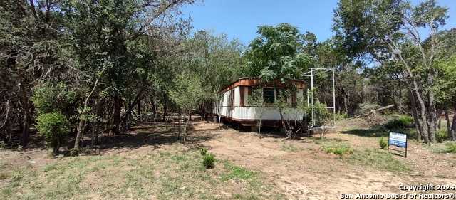 photo 1: 134 Hidden Valley Dr, Bandera TX 78003