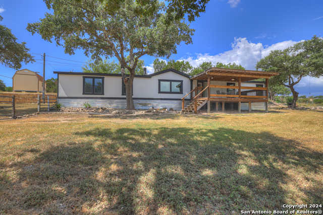 photo 1: 340 SIR WINSTON DR, Canyon Lake TX 78133