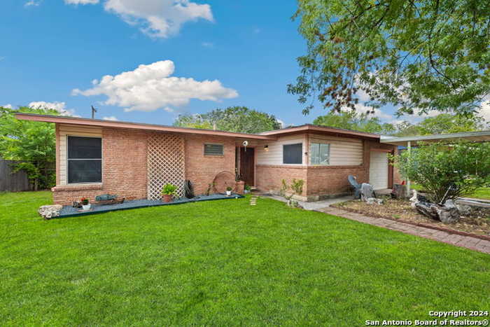 photo 1: 310 Radiance Dr, San Antonio TX 78218