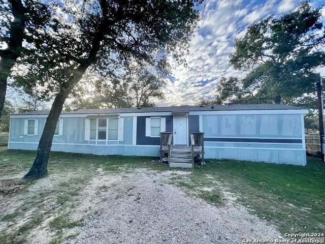 photo 1: 22831 Grand Springs, Elmendorf TX 78112