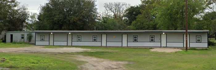 photo 1: 106 W Fulton Street, Mathis TX 78368