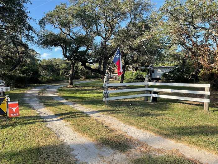 photo 1: 322 Whispering Woods Drive, Rockport TX 78382