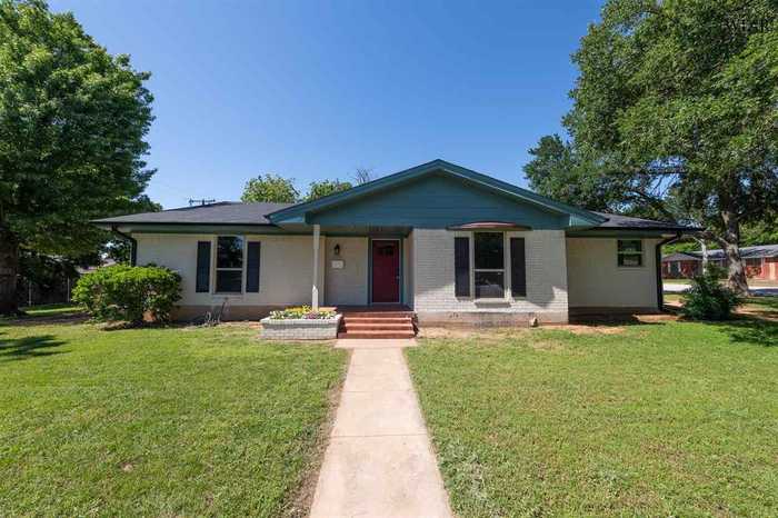 photo 1: 1516 E SPRING STREET, Henrietta TX 76365