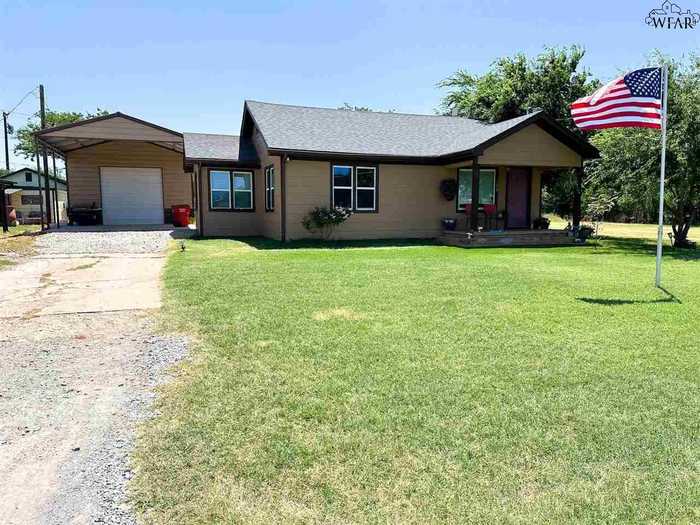 photo 1: 109 S WHITAKER STREET, Holliday TX 76366